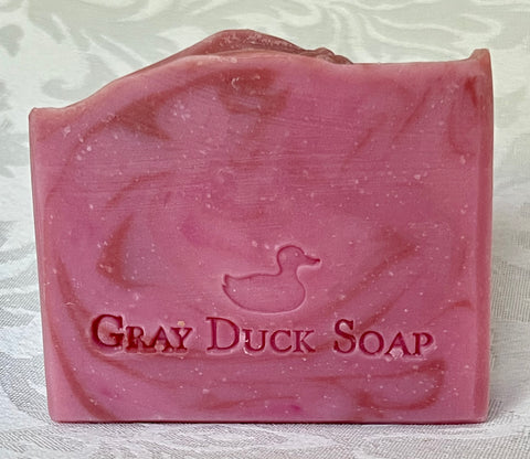 Bar of pink Love Always soap with 'Gray Duck Soap' branding on a white background.