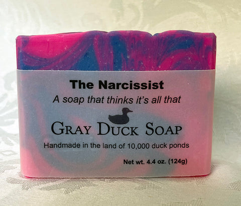 the Narcissist label on blue and pink soap